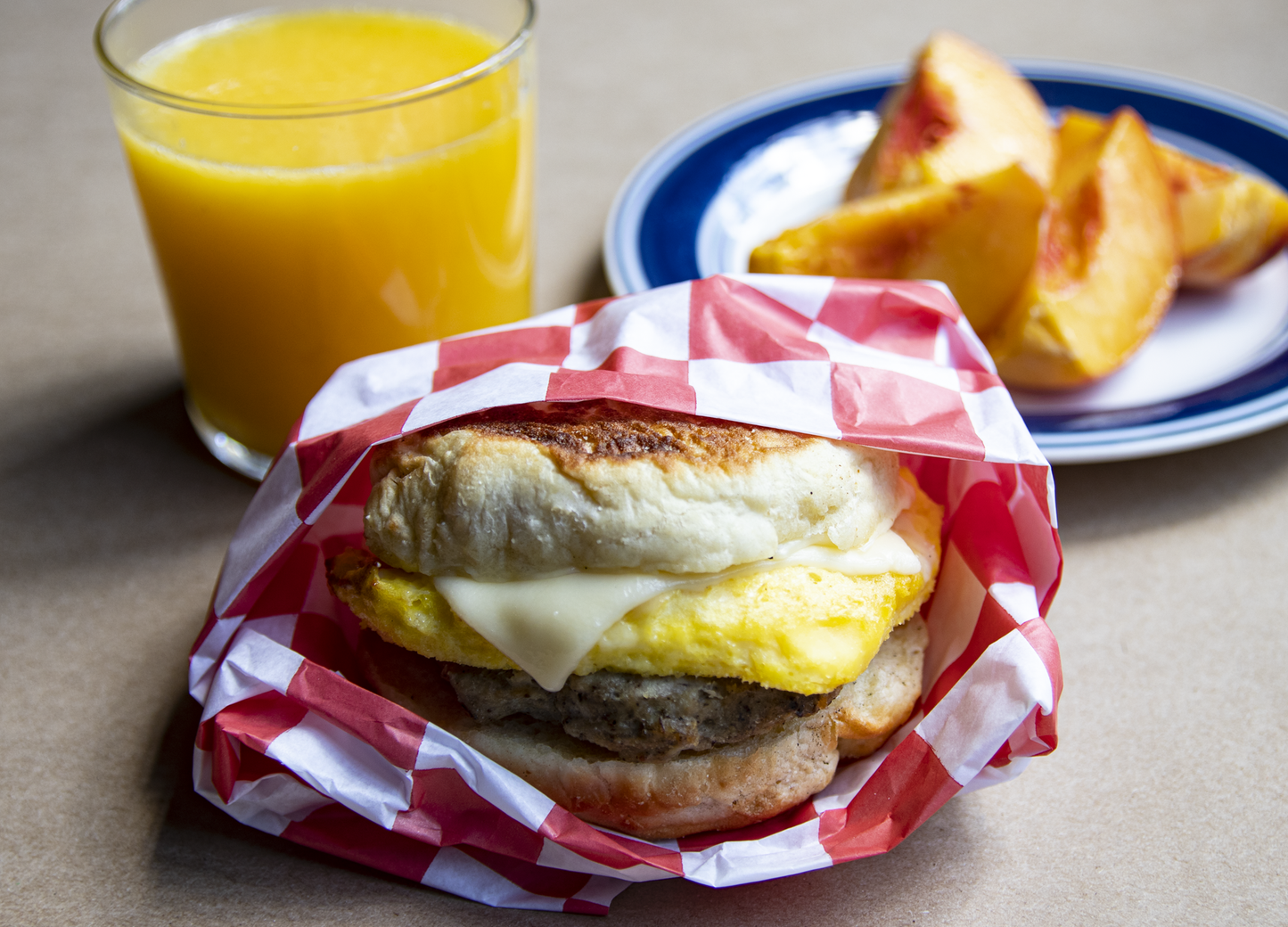 Sausage, egg, and cheese biscuit breakfast sandwich. Mik's favorite breakfast and we don't mean fast food Cook from Frozen (or thaw the night before in your refrigerator for faster cook time) Pastured Pork Sausage from Hunter Cattle Farms Or Vegetarian Beyond Sausage House made Local Egg Patty American Cheese (because you have to...) and an English Muffin We suggest serving this with Honey or a favorite Jam