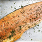 JenChan's - Our in house Smoked Salmon 8 ounces of salmon per portion OR Whole Salmon Side Perfect on a Bagel with some cream cheese, farm tomatoes, and capers. Or try it on a salad; it is quite delicious seared just as you would enjoy a salmon filet. 